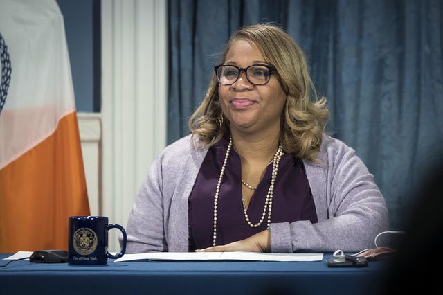 Schools Chancellor Meisha Porter smiles while sitting a table in the Blue room in City Hall